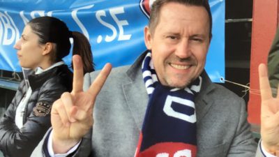 Suppporter på läktaren på en fotbollsmatch